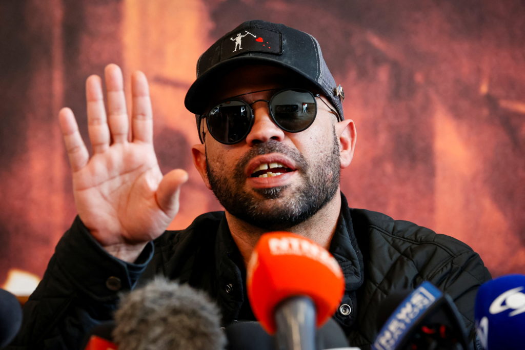 Ex-Proud Boys leader Enrique Tarrio tells PBS News he believes he’s owed tens of millions from DOJ fund